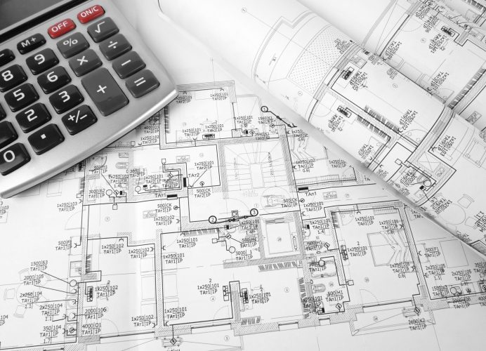 High angle view on the plan of electrical installation with calculator